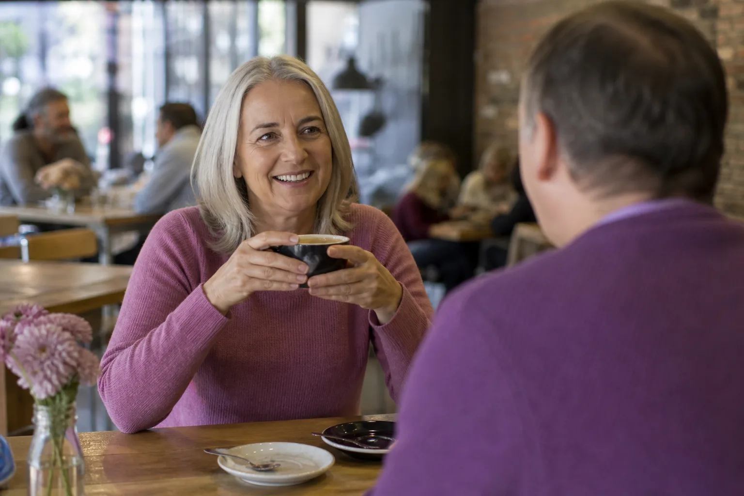 Woman enjoying coffee during a relaxed daytime date in Bedfordshire