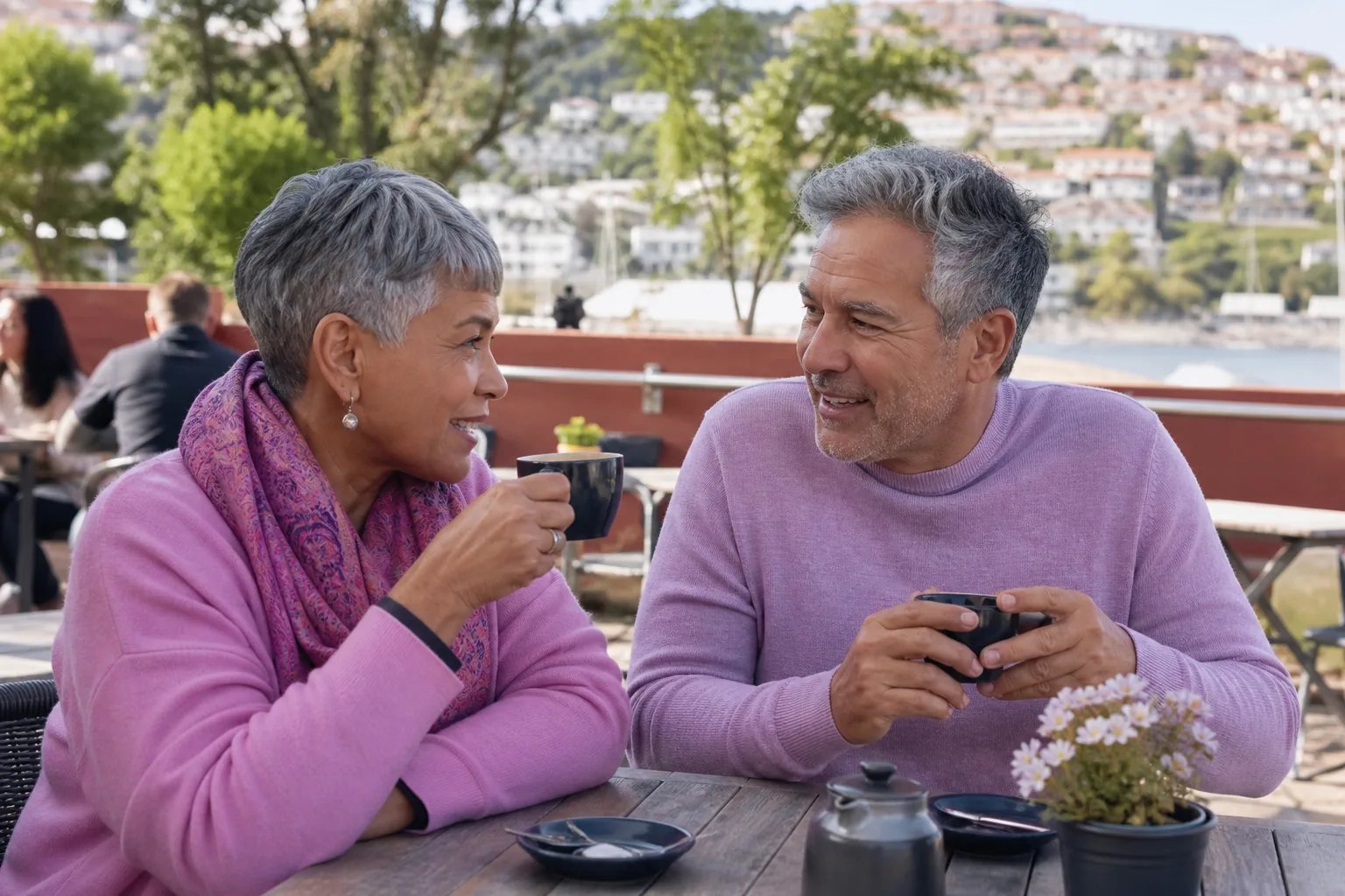 Mature couple talking during a relaxed walk in a Bedfordshire park